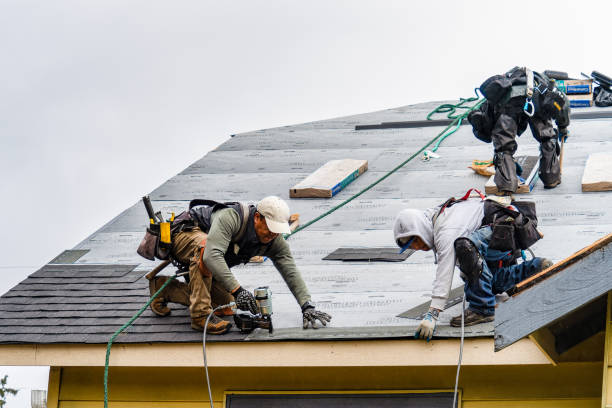 Professional Gutter Installation technician working in Bremond, TX